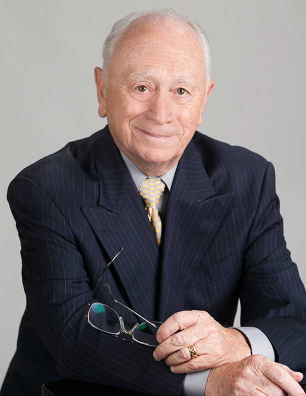 corporate portrait of lawyer & author in pinstripe suit