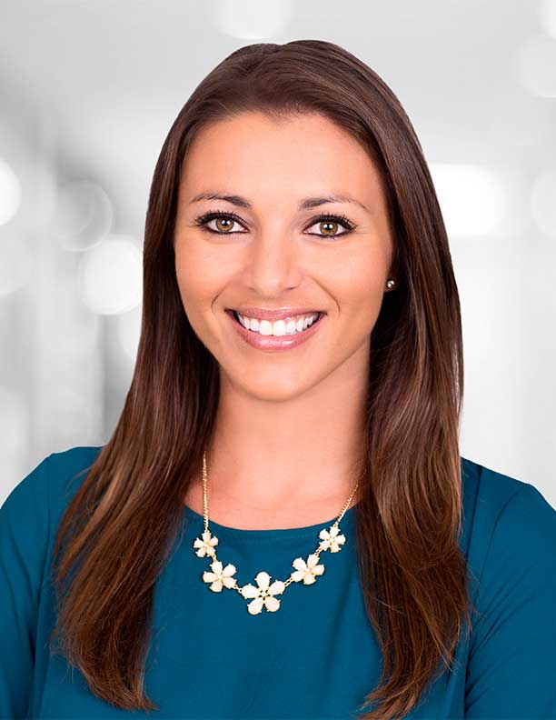 corporate headshot of woman photographed on location at office in Orange County