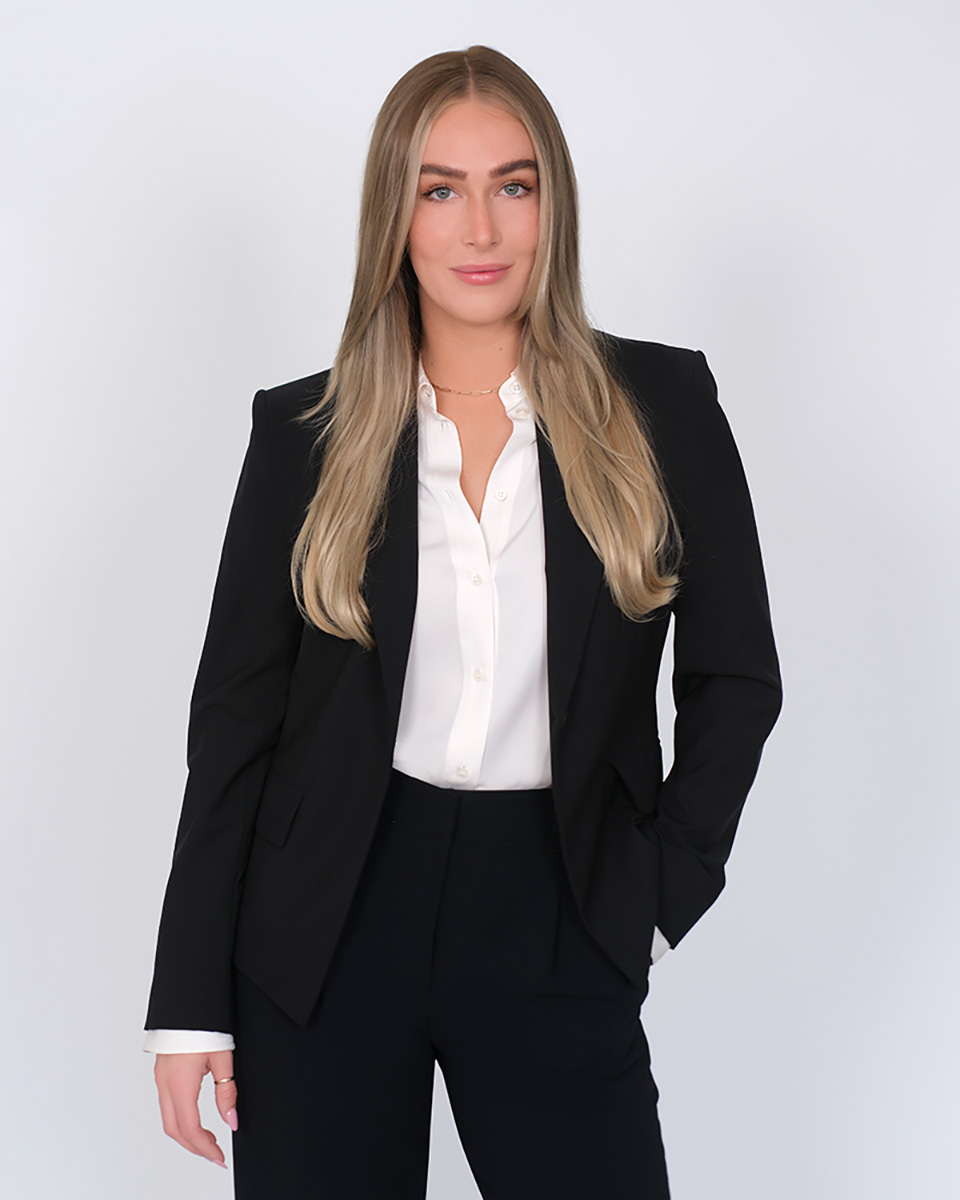 Business Woman wearing black suit casual pose in Studio Irvine